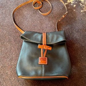Dooney & Bourke Black/Cognac leather crossbody bag.